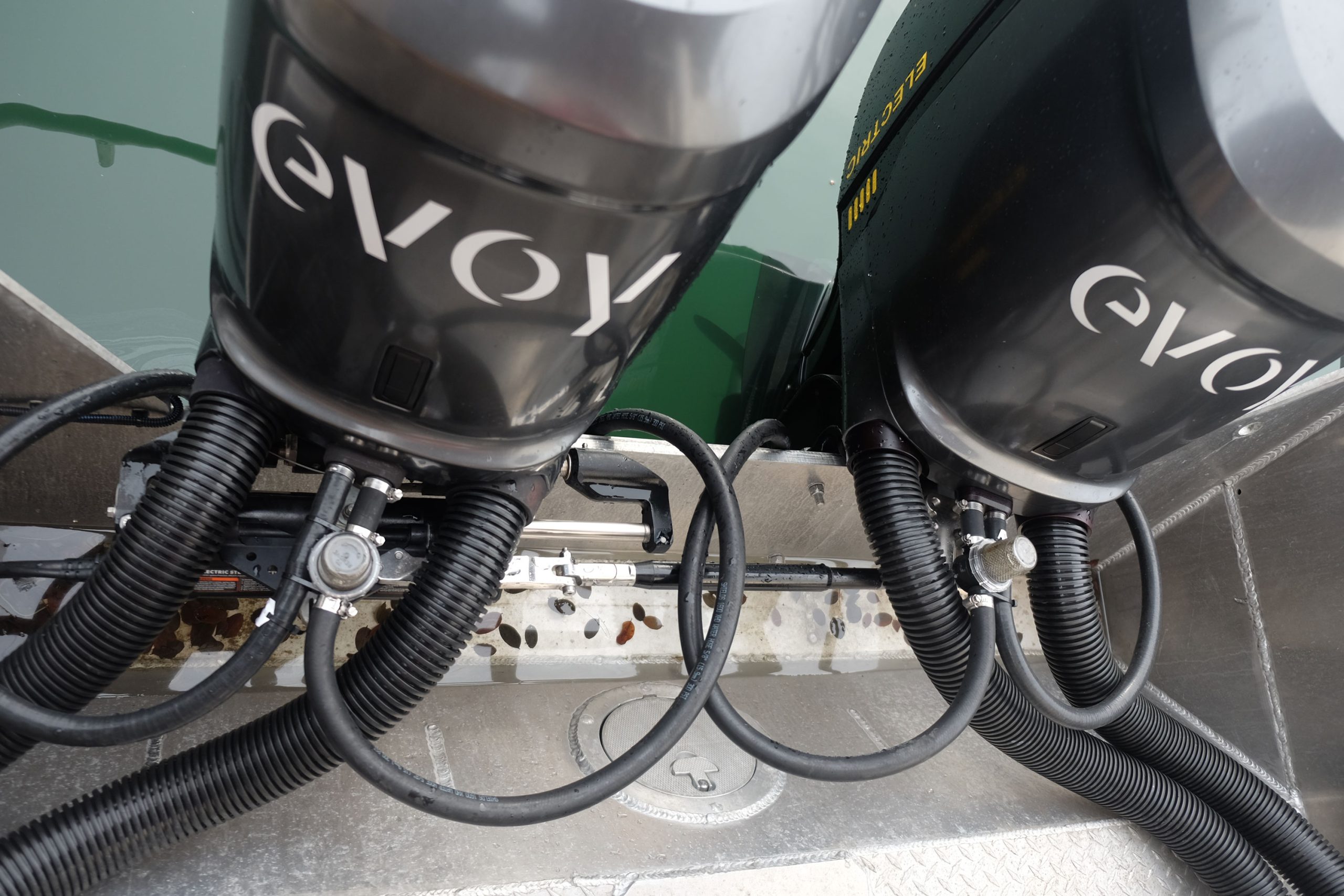 Two Evoy outboard motors.