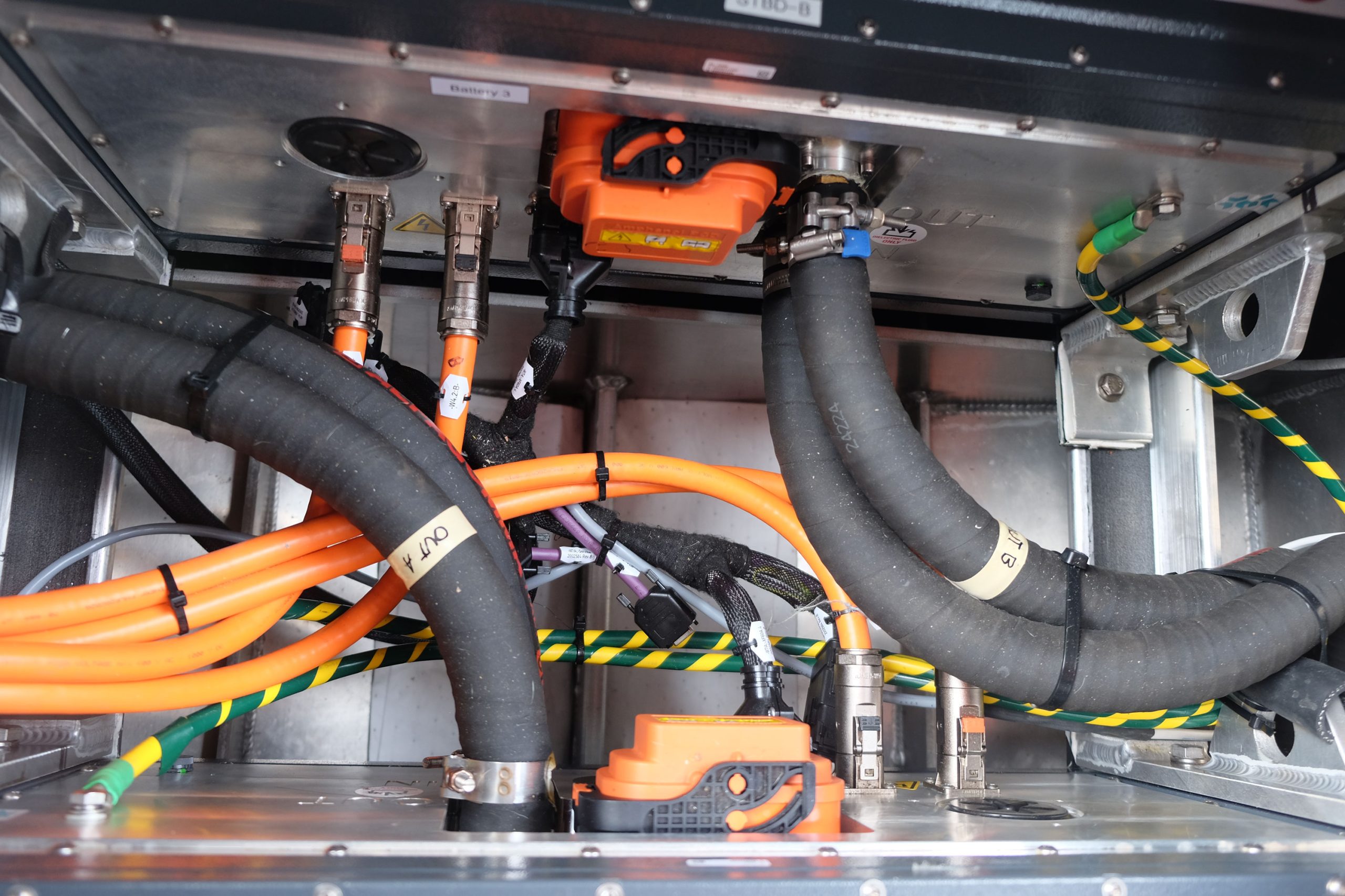 Electrical connections and cooling inputs.